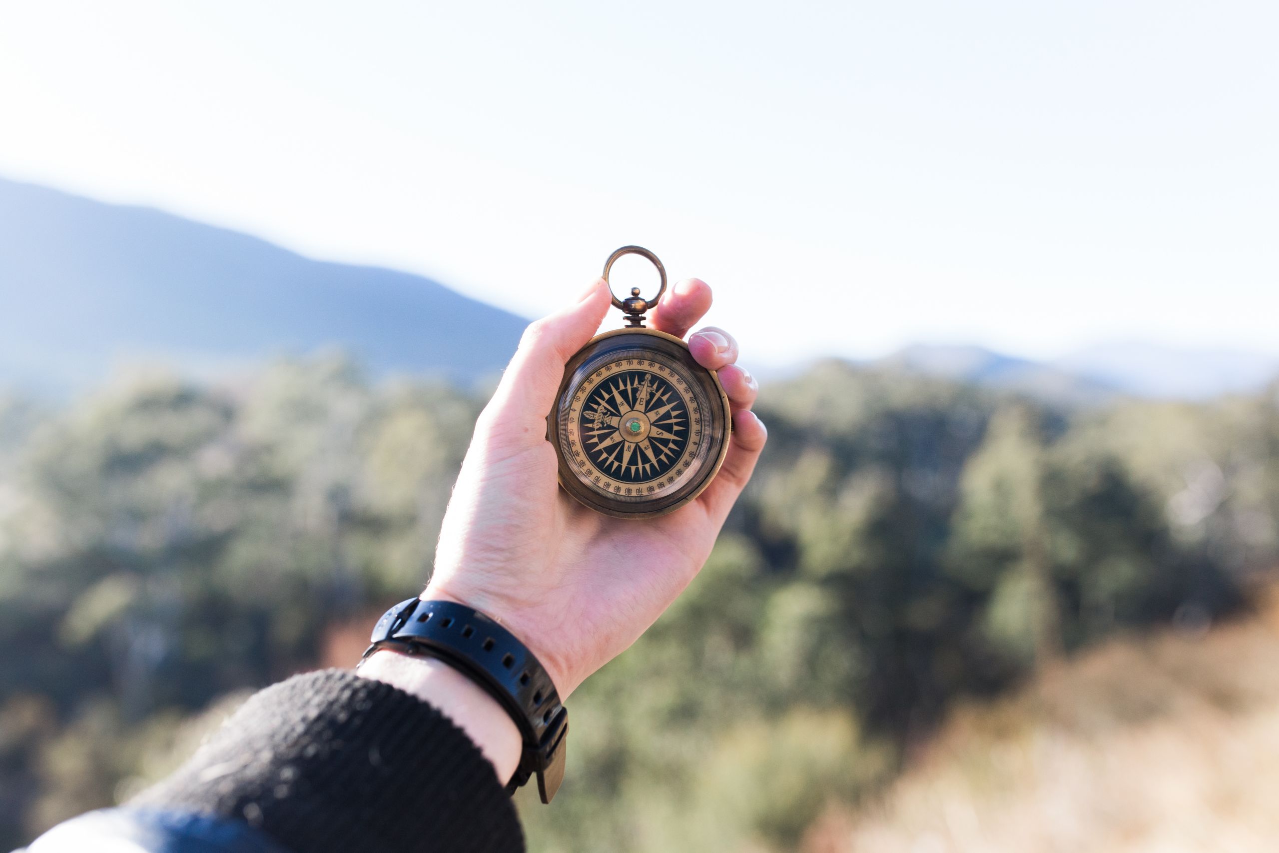 Hand holding old stopwatch