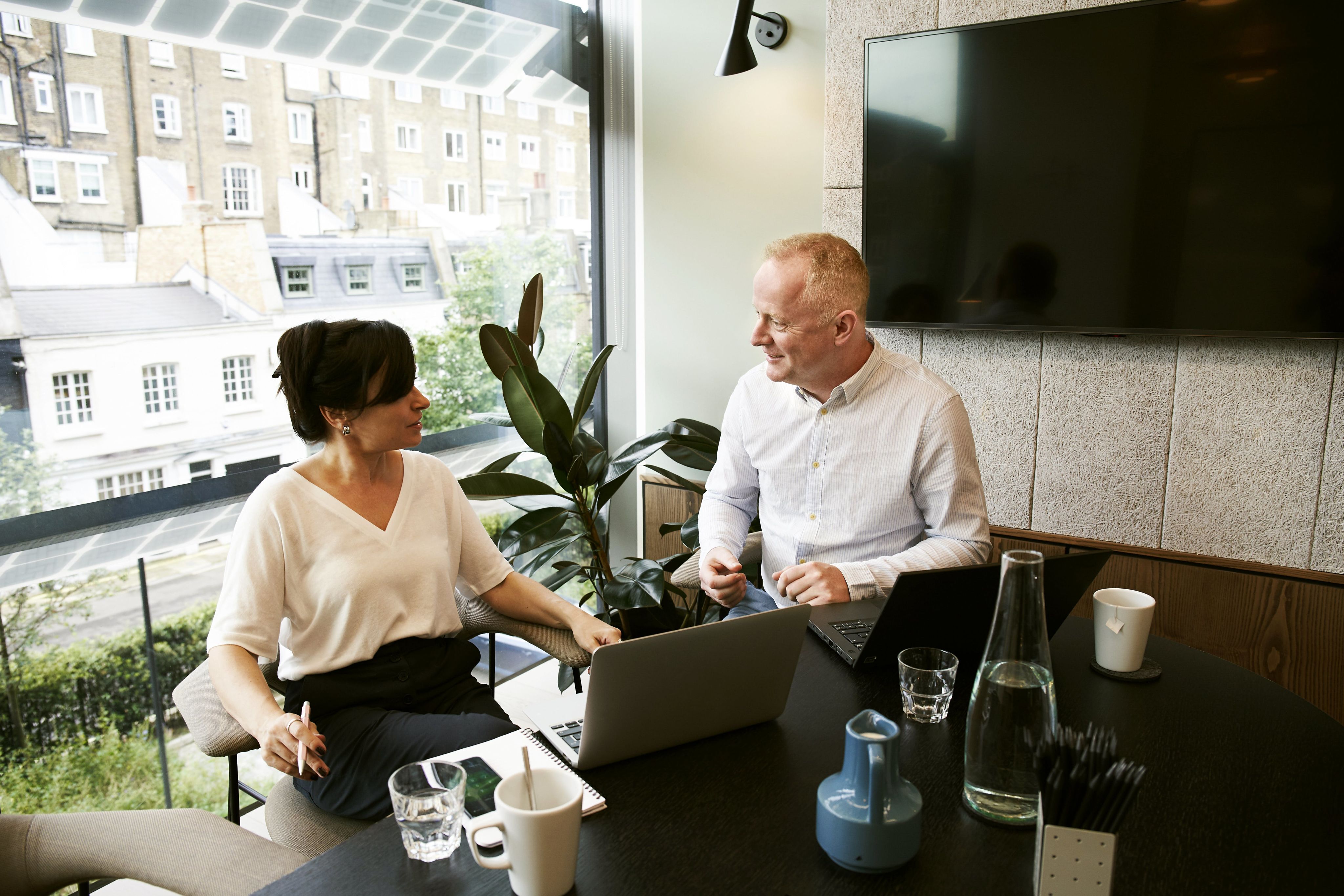 image of a man and a woman having a meeting